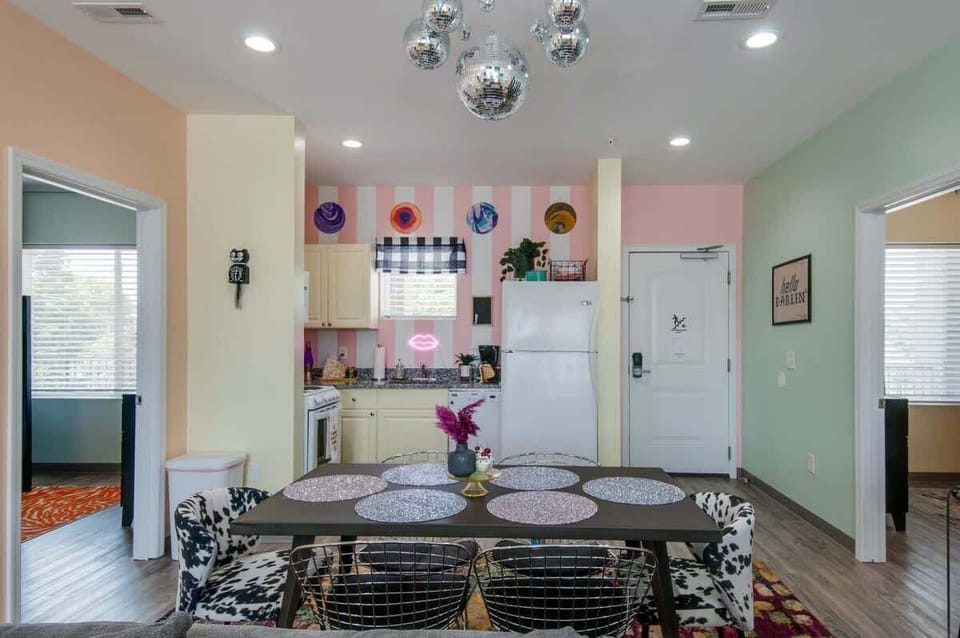 Discover this chic Nashville vacation rental, perfect for bachelorette parties or family reunions! Gather around the elegant dining table or unwind in the stylish living space, all just moments from downtown's vibrant Music City vibe!