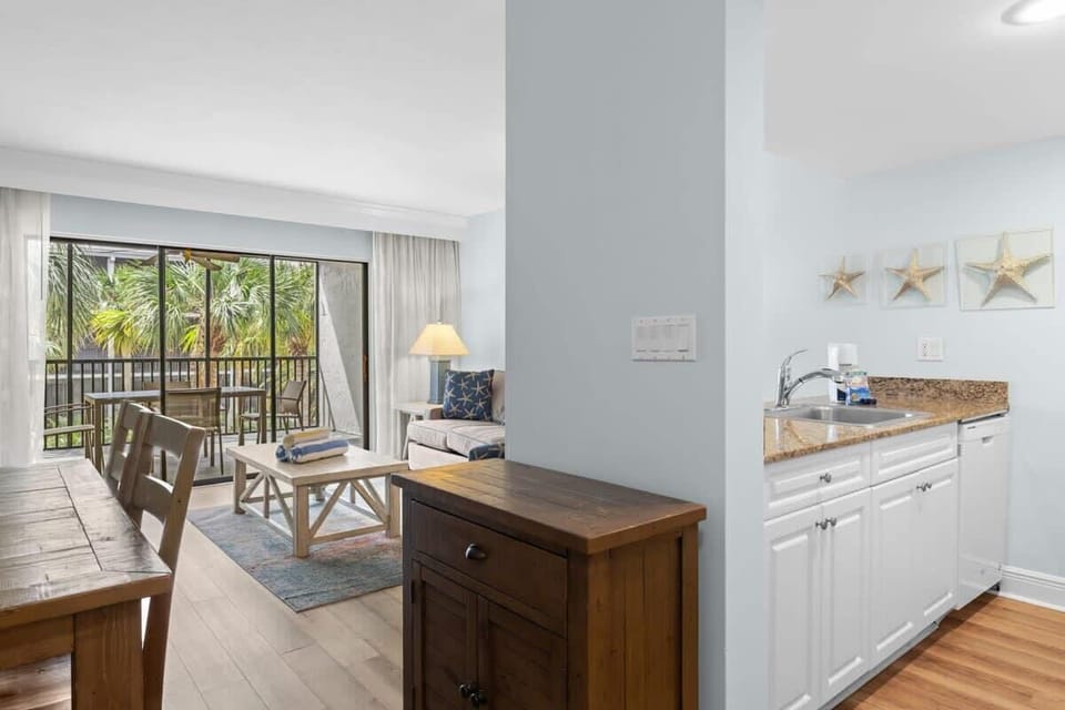 Fully equipped kitchen and dining space for four guests make this unit an exceptional residence for your next vacation
