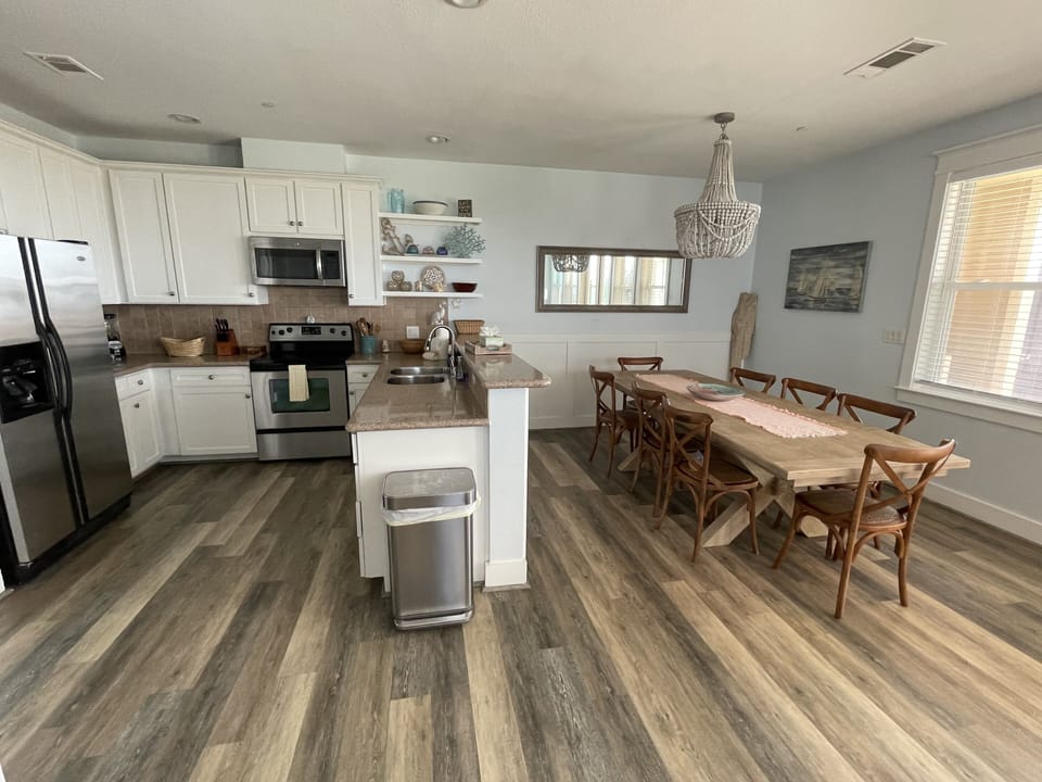 Kitchen is open to dining area.