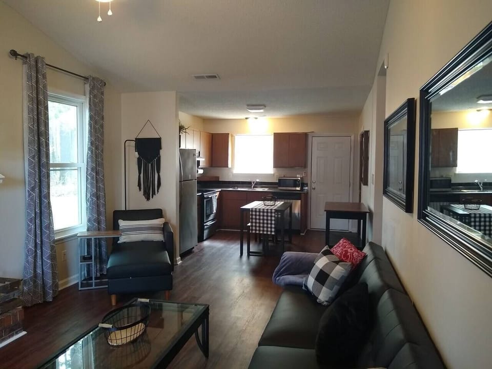 Flow seamlessly from conversations to cuisine in our open-plan living space. Ideal for entertaining!