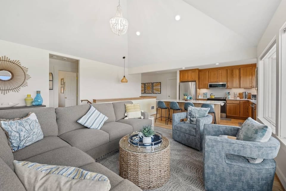 Coastal vibes and open concept for family gatherings.  