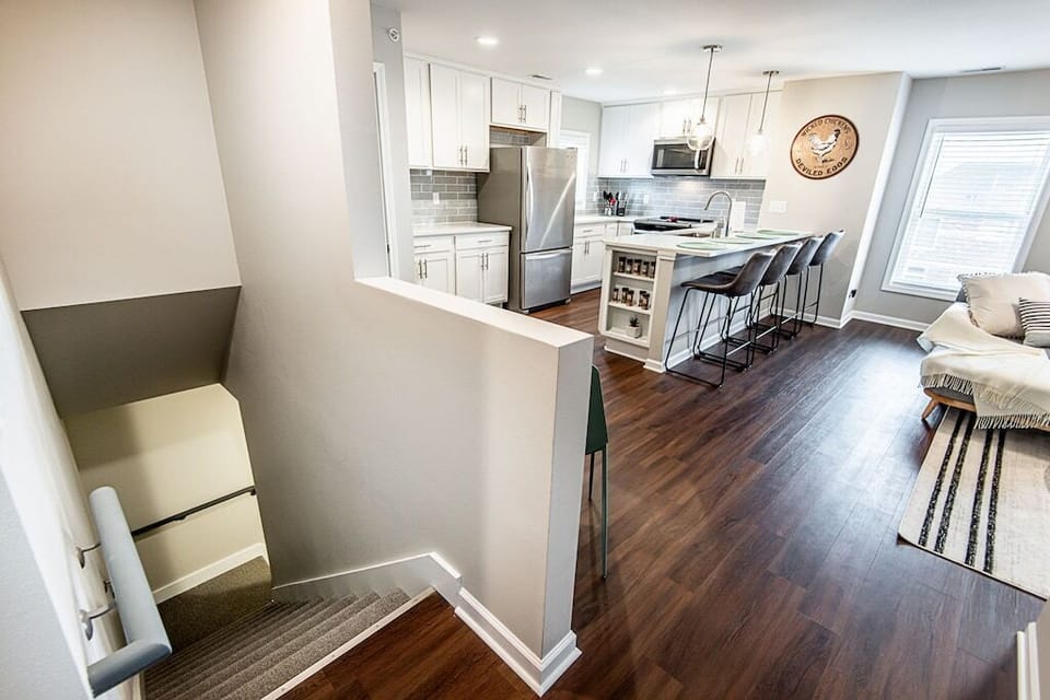 Unit stairs-leads to kitchen and living room 