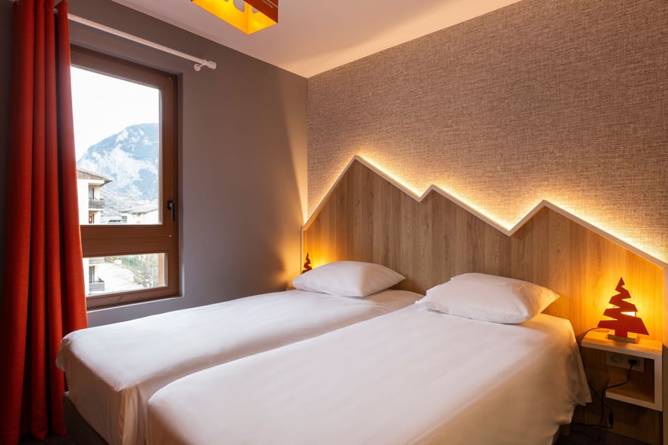Relax on the comfy bed after a day outside.