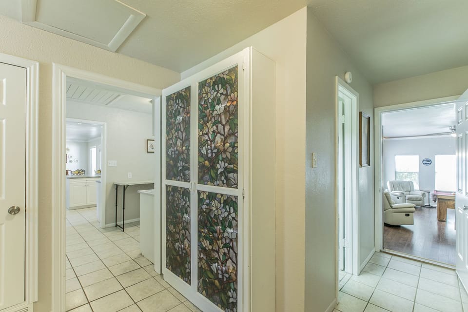 Game Room and Half Bath to the Right / Laundry Room and Kitchen to the Left