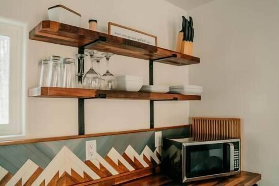 included is microwave, air fryer, burner, dishes and everything you need to cook