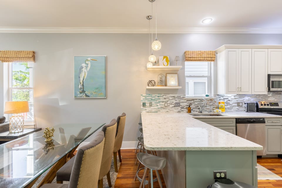 Additional barstool seating at the breakfast bar.