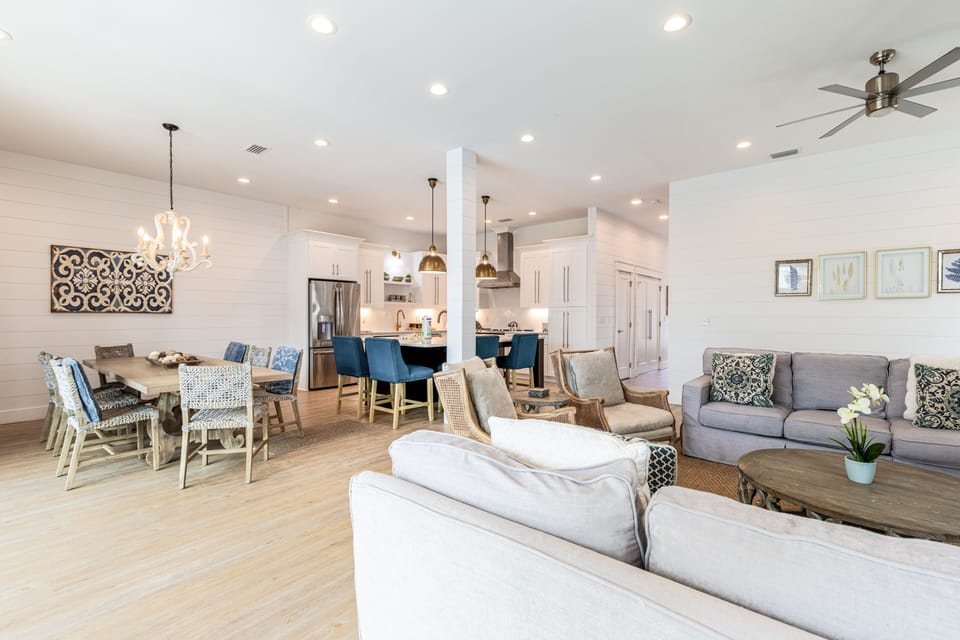 Living room is near the dining area and kitchen.