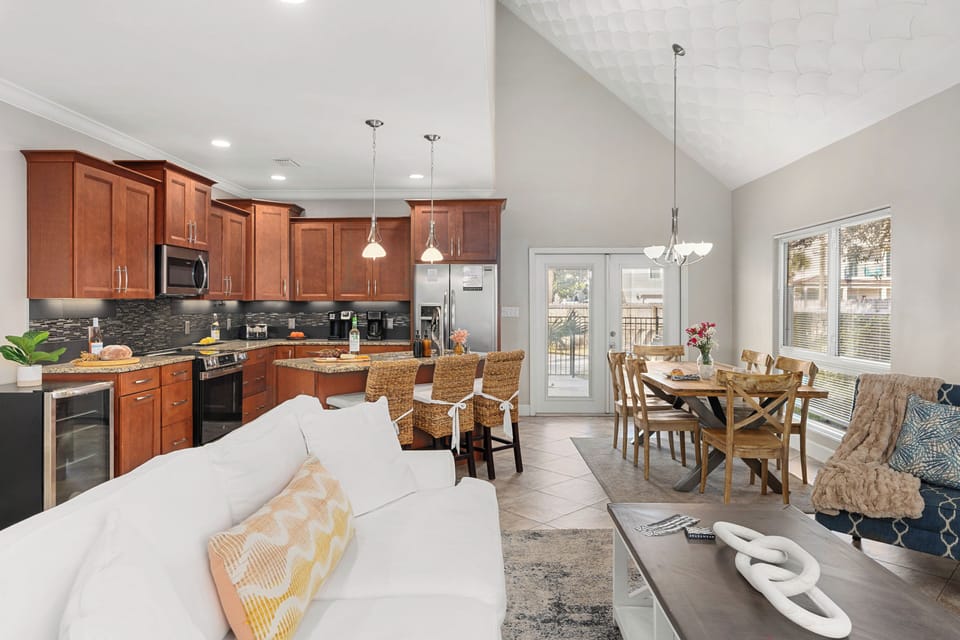 Living room is near the kitchen for easy group connection.