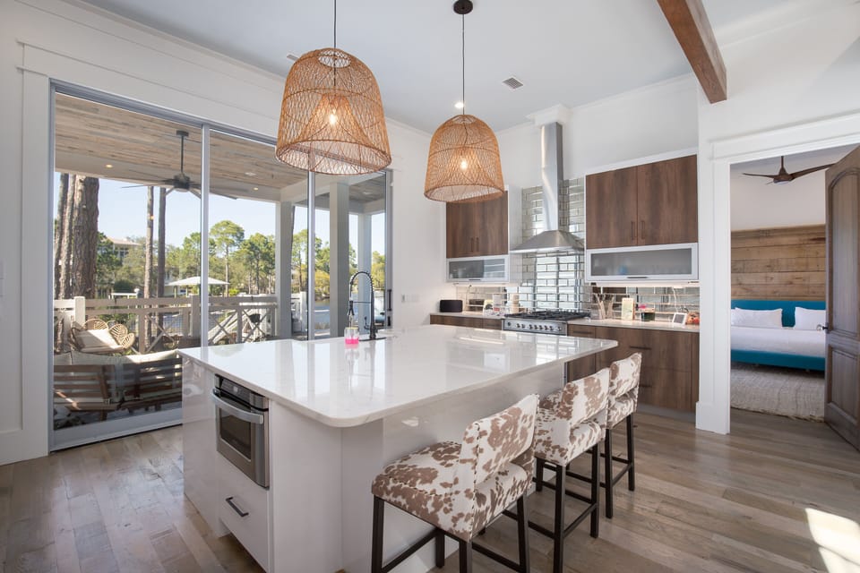 Spacious kitchen with breakfast bar seating.