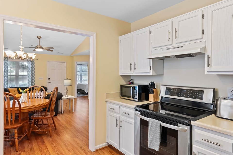 The open floor plan lends to cooking a meal while hanging out with the family.