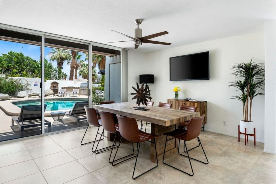 A beautifully designed dining area with a touch of mid-century modern inspiration