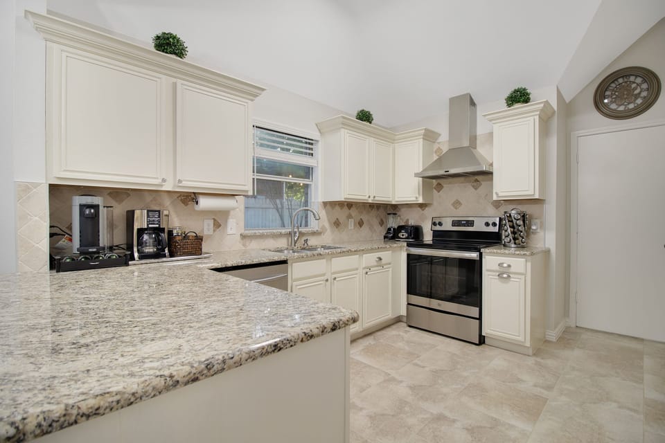 Full Kitchen- All stainless steel appliances, spacious, and fully stocked