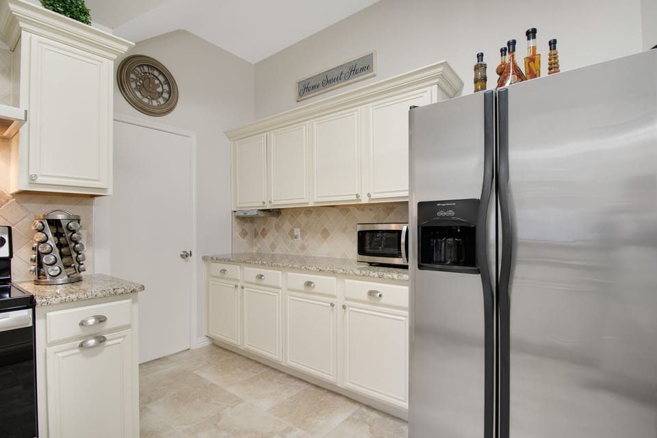 Full Kitchen- All stainless steel appliances, spacious, and fully stocked