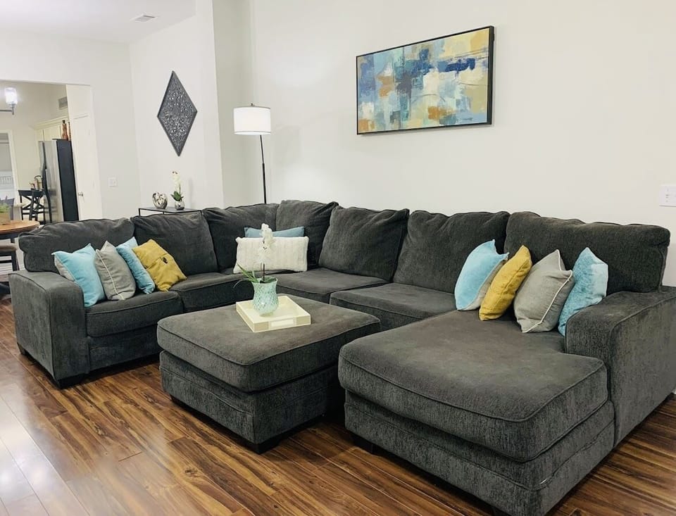 Living room- Spacious open concept with beautiful sectional