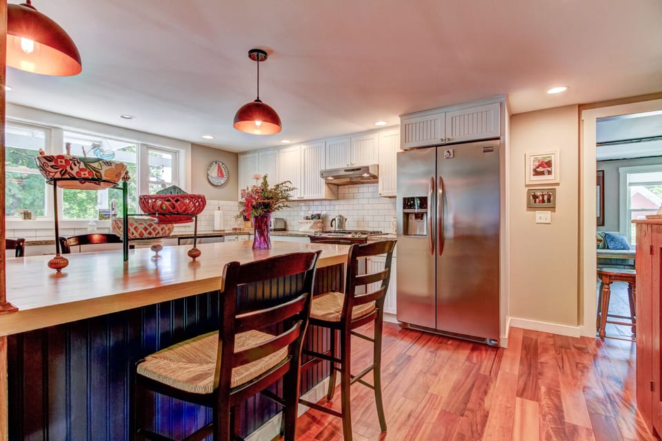 Another view of the kitchen, huge refrigerator.