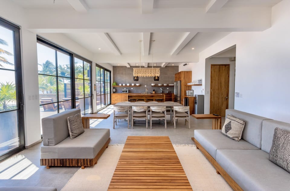 Spacious great room with lots of light & high ceilings