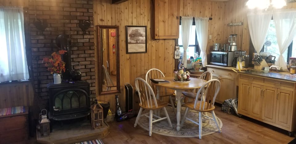 Kitchen area for 4 people to dine indoors, cuisinart appliances 