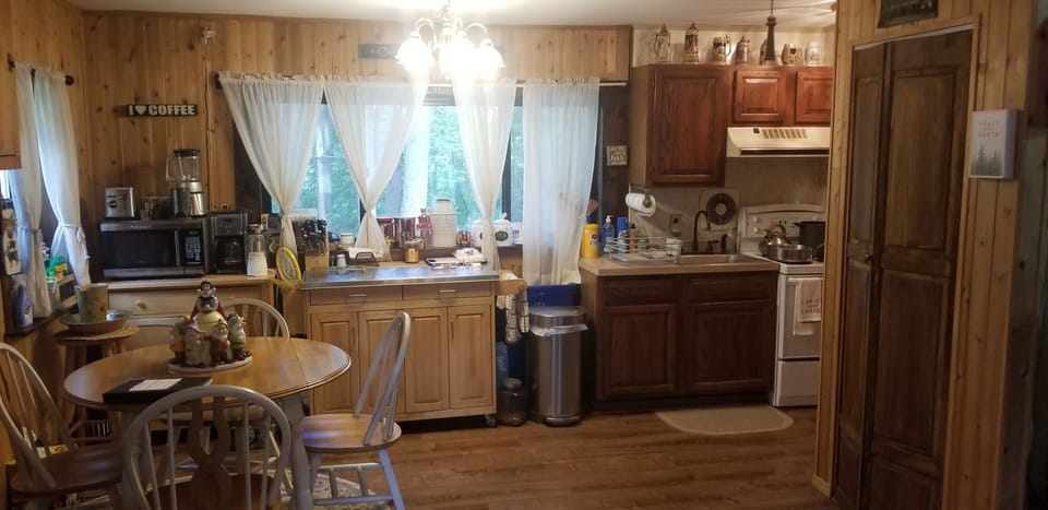 Kitchen area with Viking pots and pans, Henckel Knife set