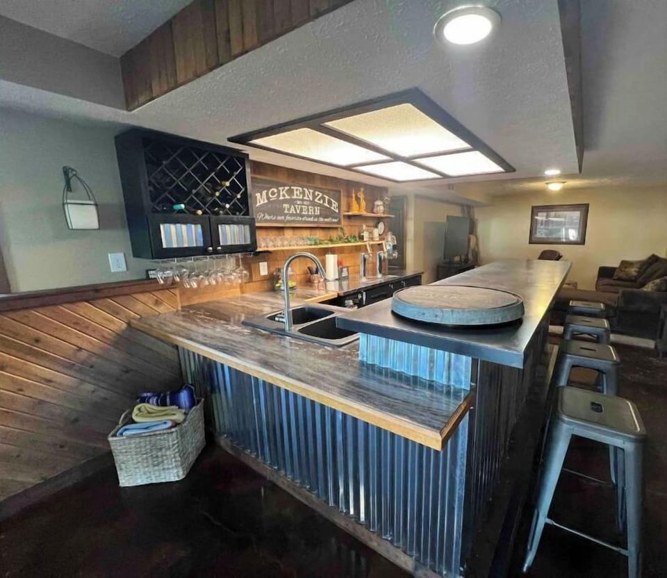 Bar area,  with full sink, extra refrigeration and glassware. 