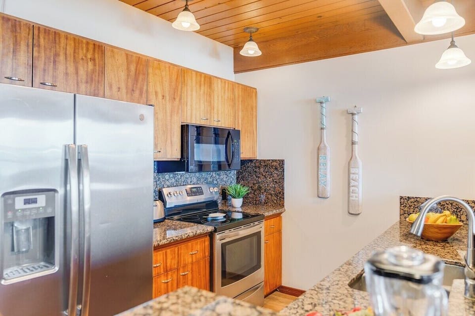 Fully equipped kitchen with stainless steel appliances