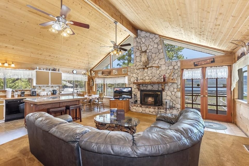 Beautiful Living Room with Stone Fireplace