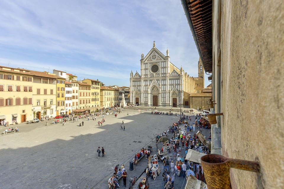 Look out over the largest piazza in Florence and the Basilica of Santa Croce.