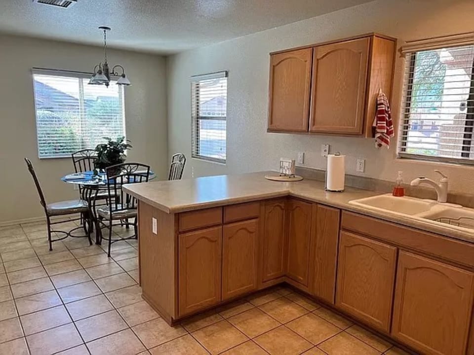 Kitchen fully stocked. Dining area seating for 7