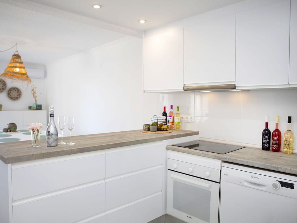 Cabinetry, Countertop, Property, White, Kitchen Sink, Kitchen Appliance, Kitchen Stove, Kitchen, Lighting, Sink