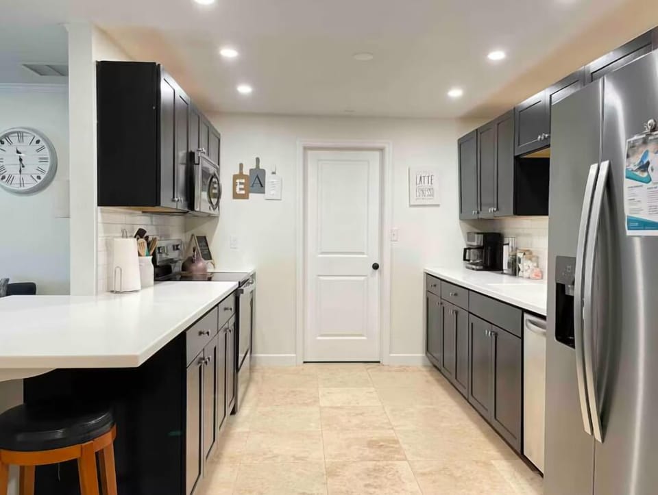 Spacious kitchen and amenities to cook your meals