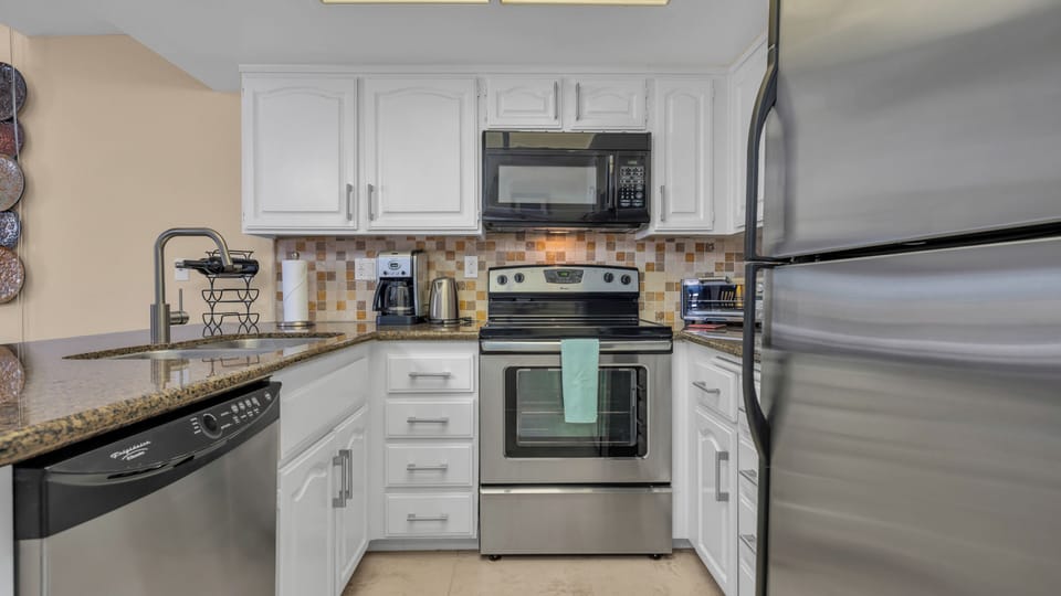 Enjoy preparing your meals on this remodeled, clean and fully equipped kitchen 