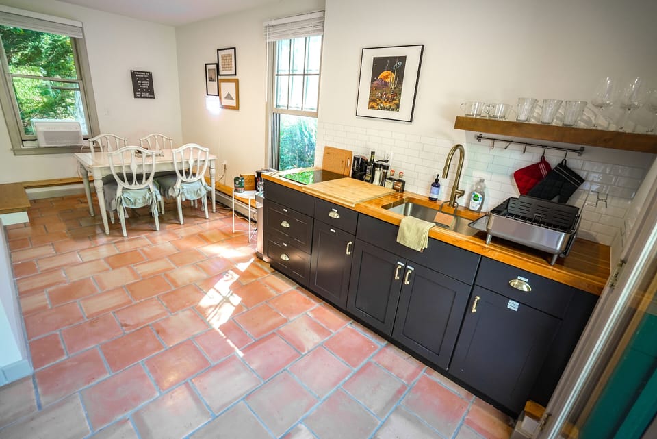1ST FLOOR: View of kitchenette and dining table