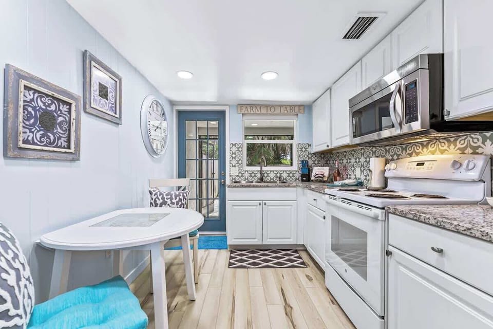 Kitchen with eat in dining area.