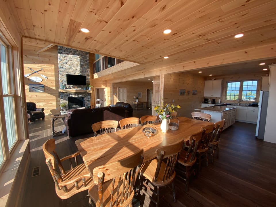 Massive live edge dining room table & huge open spacious first floor!