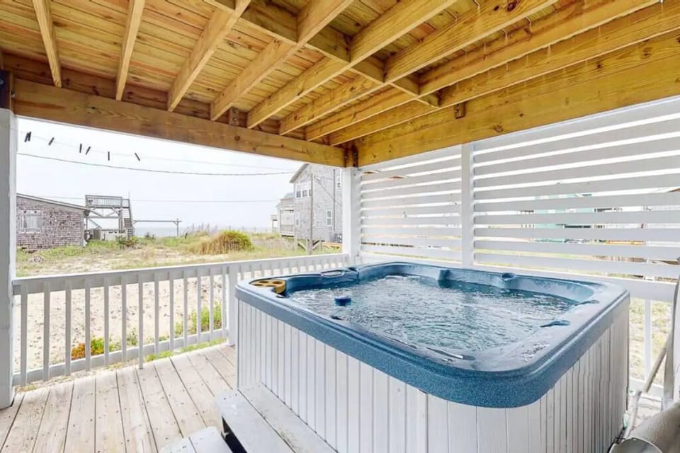 2 Queen bedrooms have direct access to the hot tub that sits on lower deck.