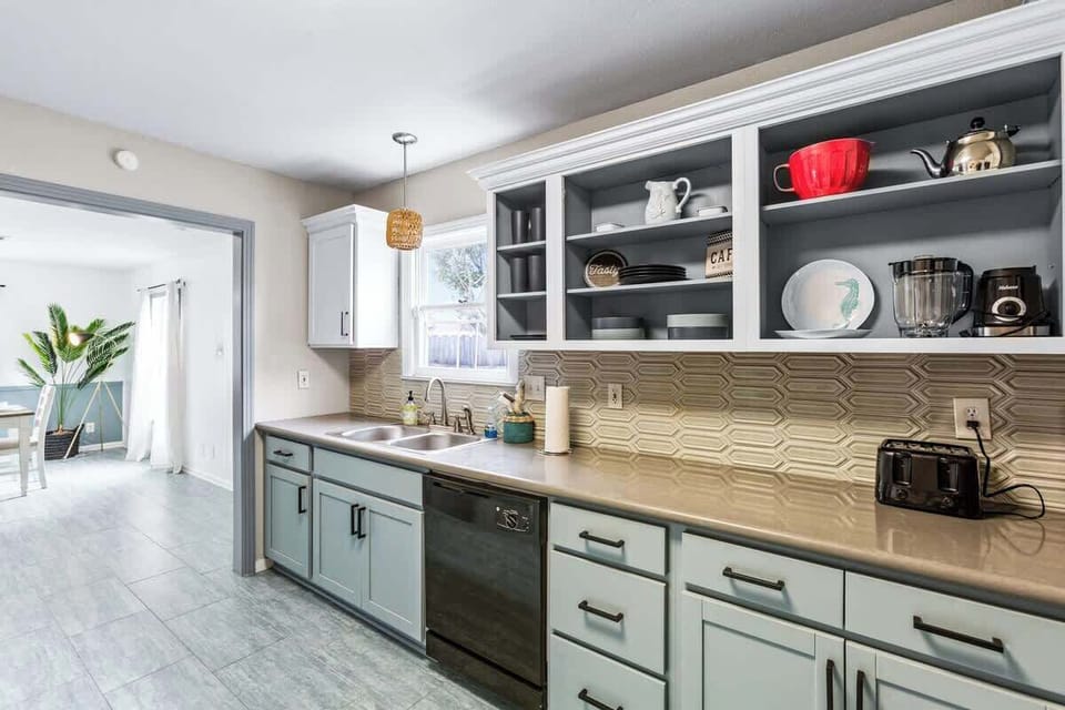 The kitchen is spacious enough to have multiple cooks putting a meal together! We have a toaster and Air Fryer as well as the basics! 