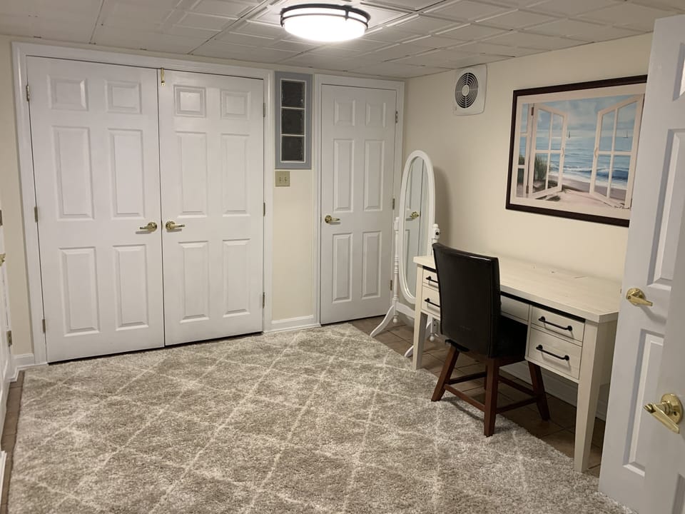 Office, with full washer/dryer opens up to bedroom.
