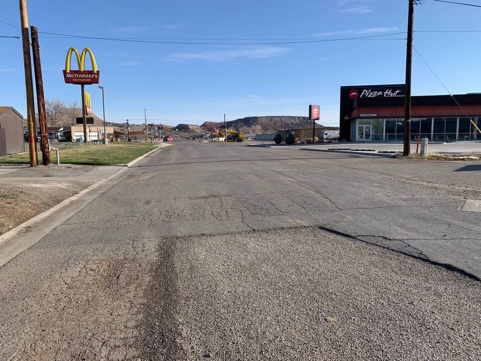 Located less than a block away from McDonald's and Pizza Hut.