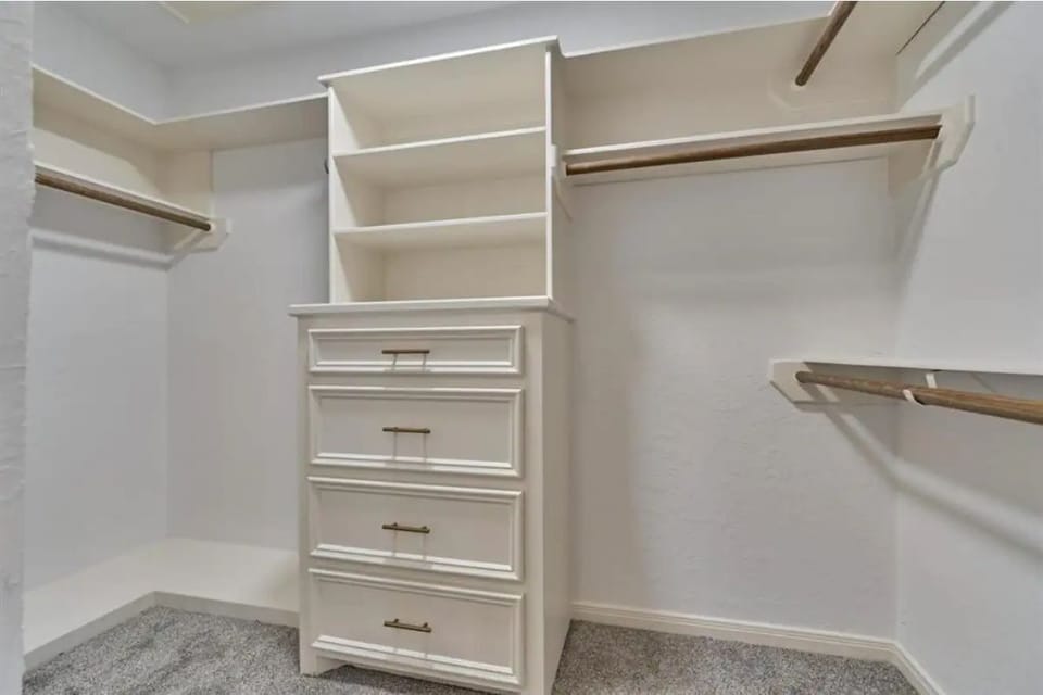 Spacious walk in closet 