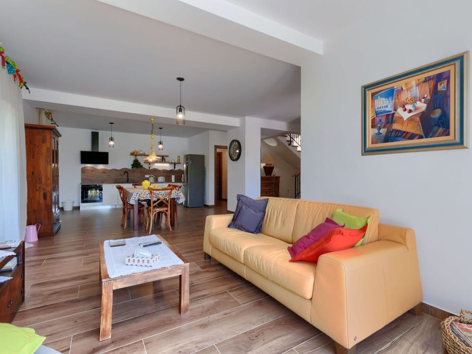 Furniture, Couch, Property, Picture Frame, Table, Comfort, Wood, Interior Design, Living Room, Orange