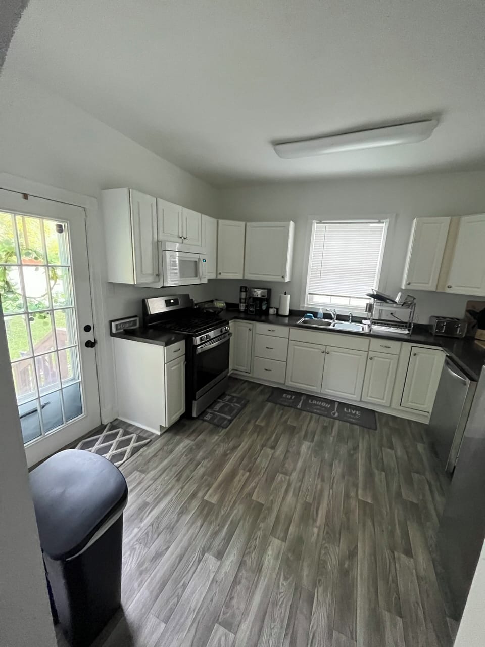 Spacious Kitchen that leads to the backyard 