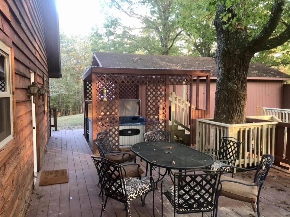 Deck/patio located at the back of the house. 