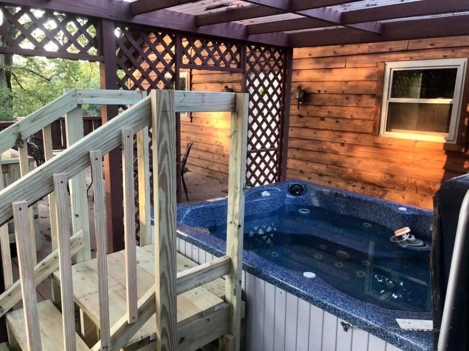 Hot tub located on the back deck. 