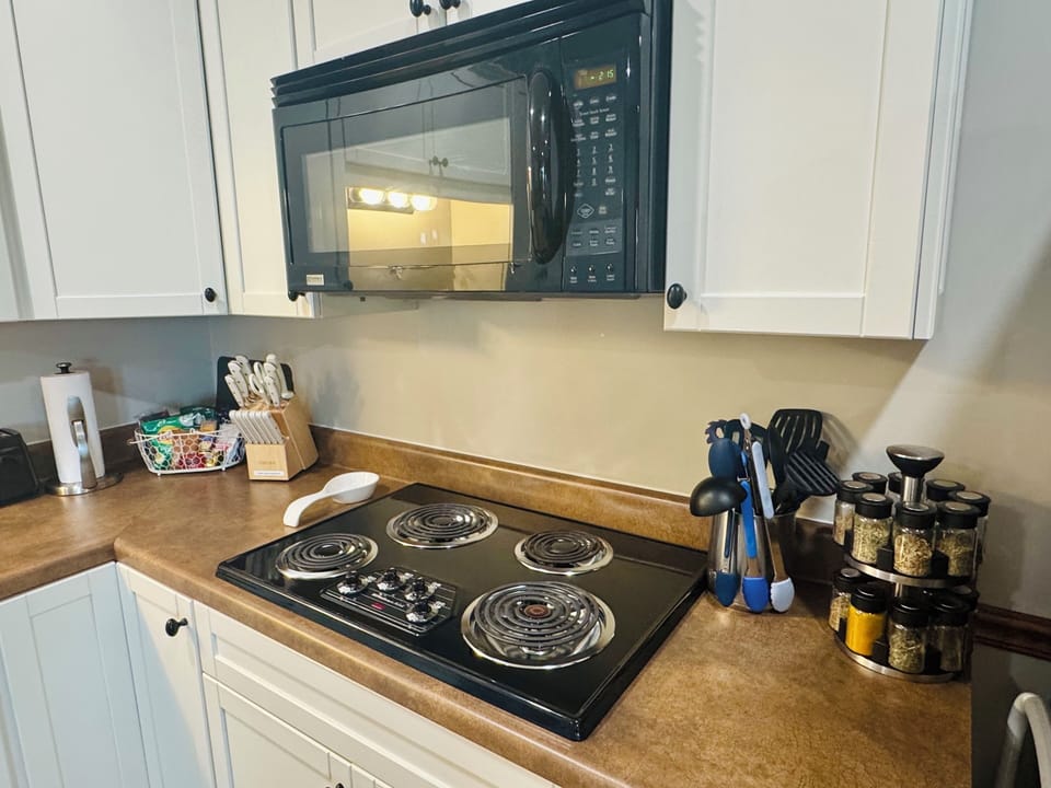 Welcome basket, convection microwave (holds up to a 13" pizza) & spice rack. 