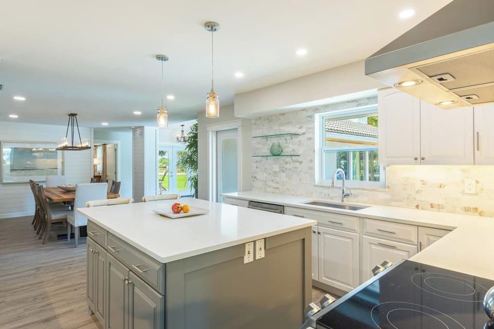This beautiful kitchen is  centrally located  to every room in the home