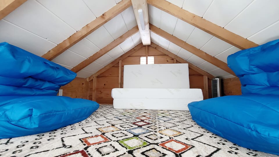 Loft reading nook with bean bag chairs
