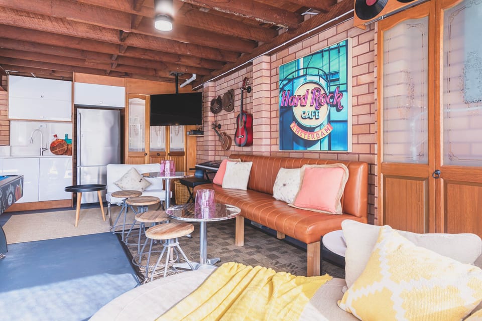 snuggle chair for two, Smart TV, full sized fridge plus additional wine fridge.