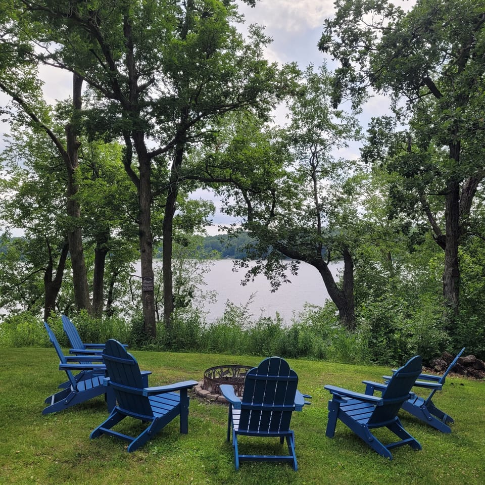 Relax & unwind with a fire while overlooking the lake