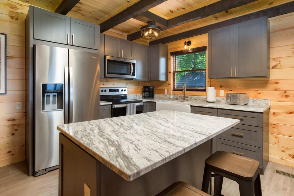 Large Granite Countertop Island In The Kitchen