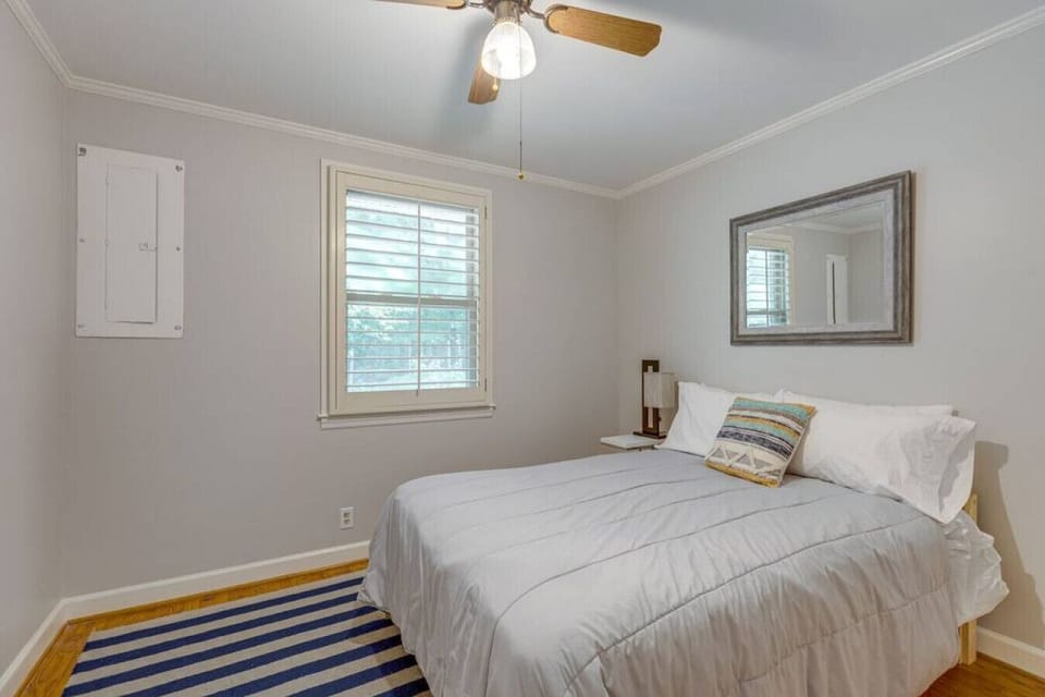 Second guest room also has a comfortable queen bed.