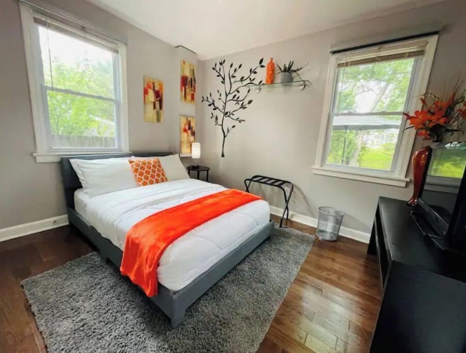Full size bed with all seasons comforter.